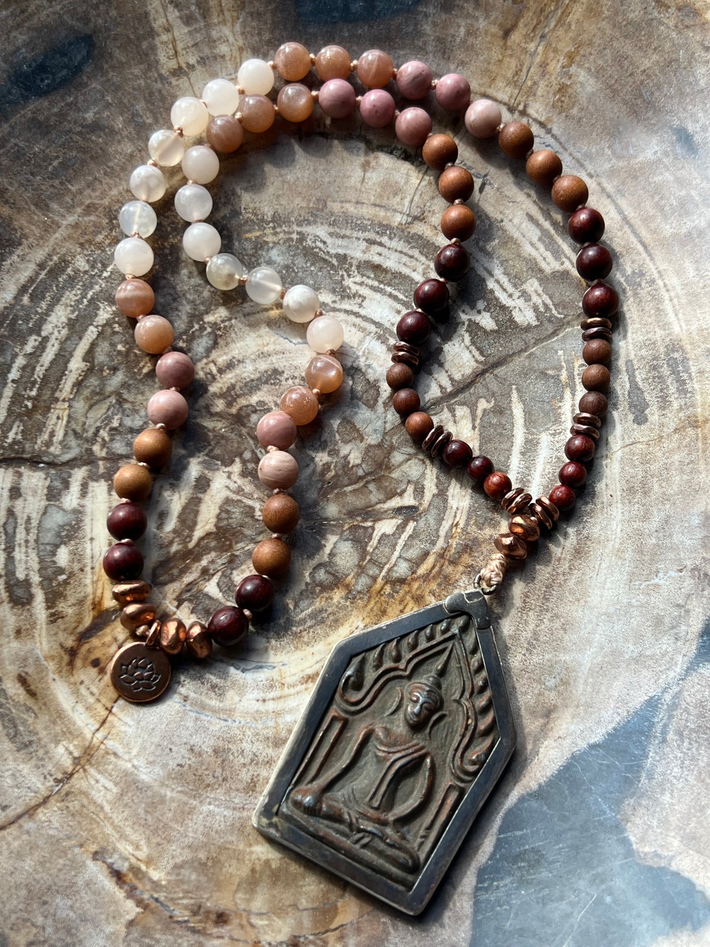 Half Mālā with Sunstone, Haitian Flower Rhodonite and Cherry Blossom Agate, Sandalwood, Indian Rosewood and Peach Aventurine with a Thai Buddha Pendant