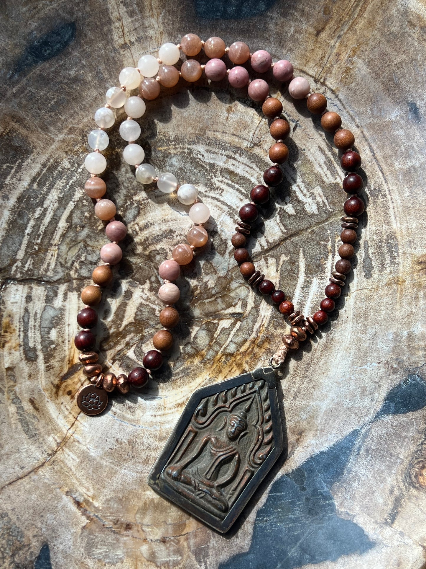 Half Mālā with Sunstone, Haitian Flower Rhodonite and Cherry Blossom Agate, Sandalwood, Indian Rosewood and Peach Aventurine with a Thai Buddha Pendant