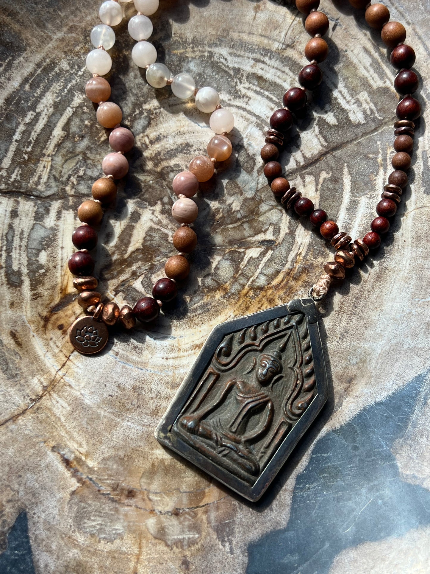 Half Mālā with Sunstone, Haitian Flower Rhodonite and Cherry Blossom Agate, Sandalwood, Indian Rosewood and Peach Aventurine with a Thai Buddha Pendant