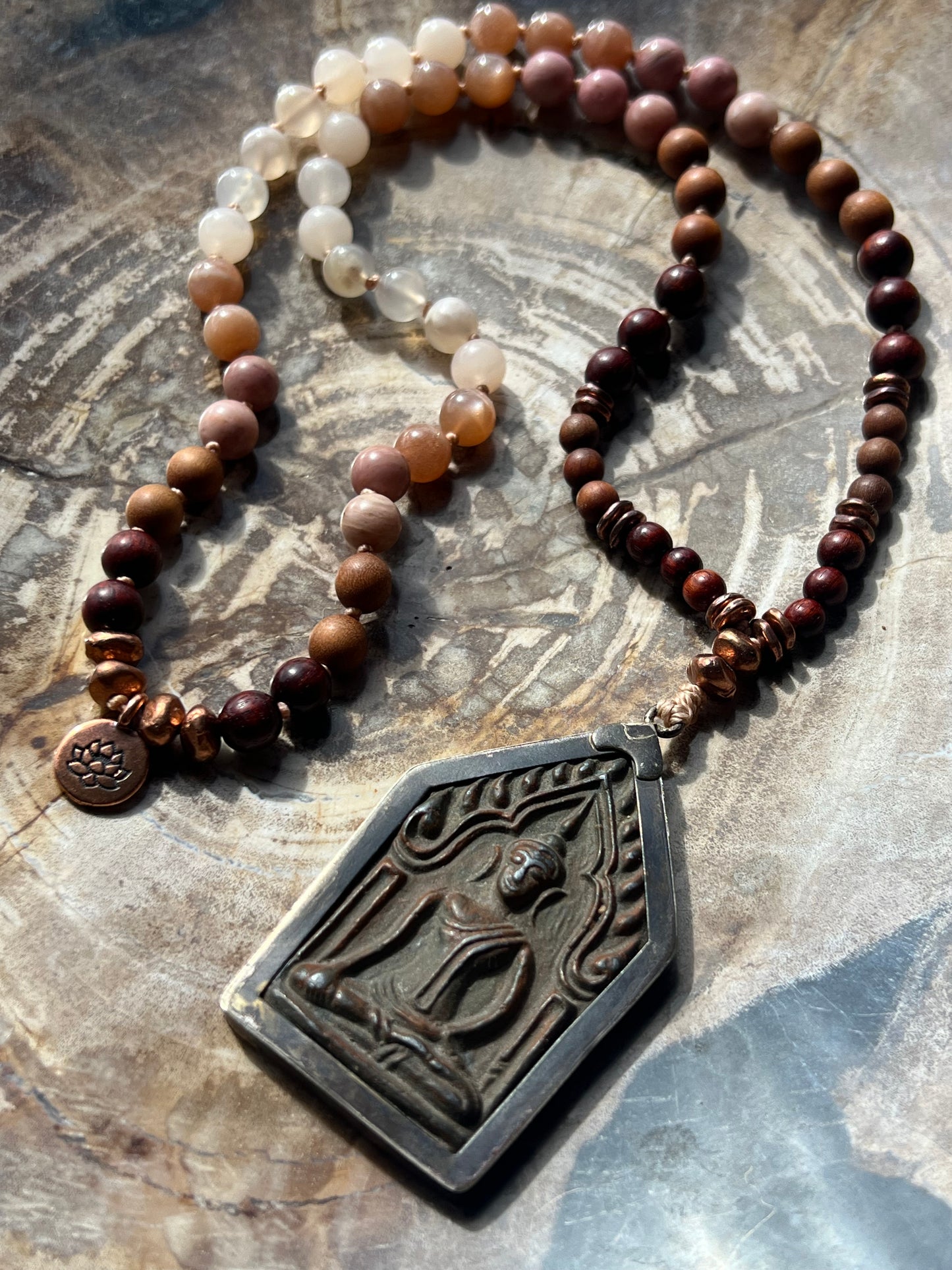 Half Mālā with Sunstone, Haitian Flower Rhodonite and Cherry Blossom Agate, Sandalwood, Indian Rosewood and Peach Aventurine with a Thai Buddha Pendant