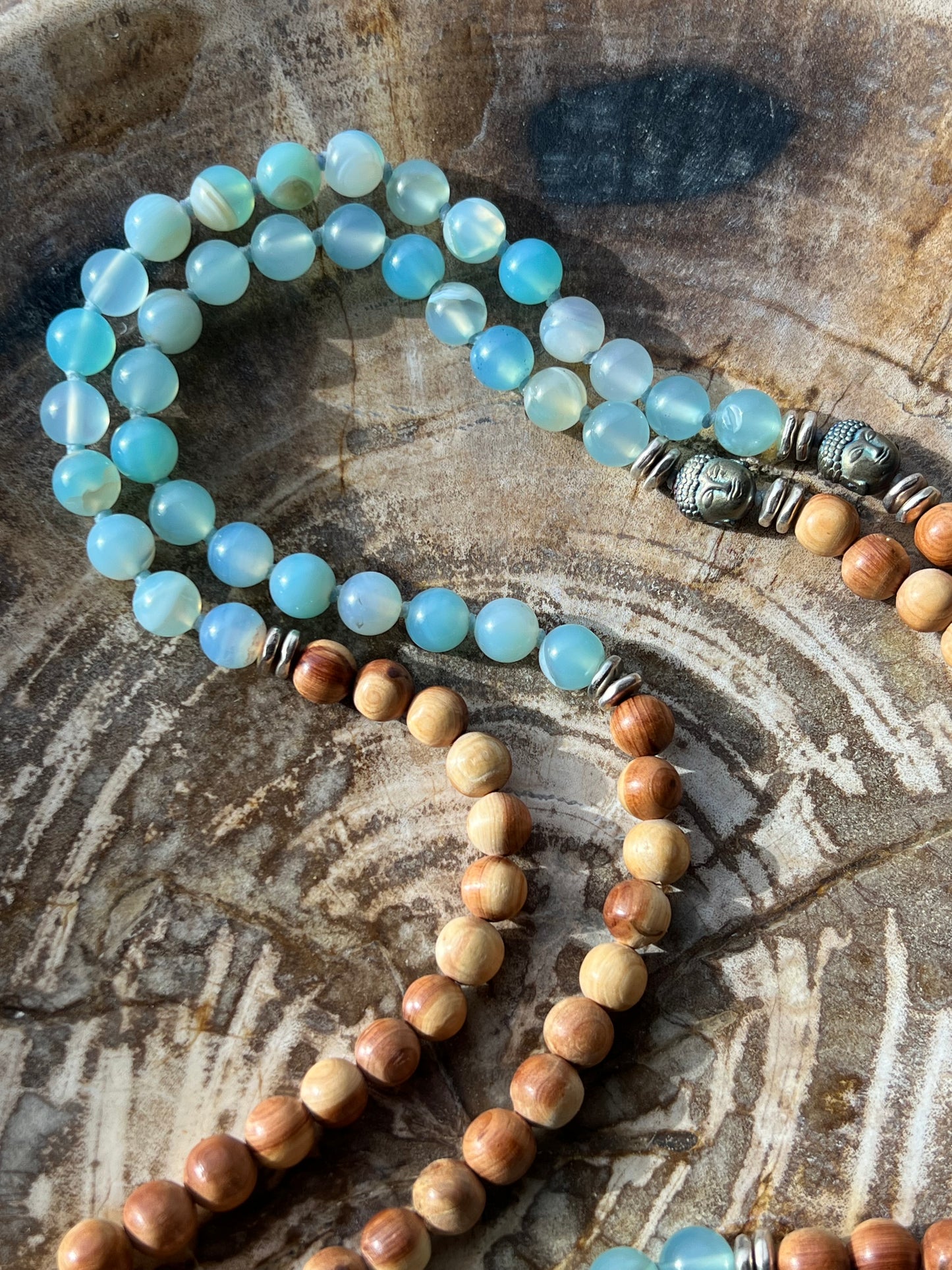 Mālā with Lake Blue Agate and Pearwood Beads with a Nepalese Silver Guru Bead, and a silky Tassel