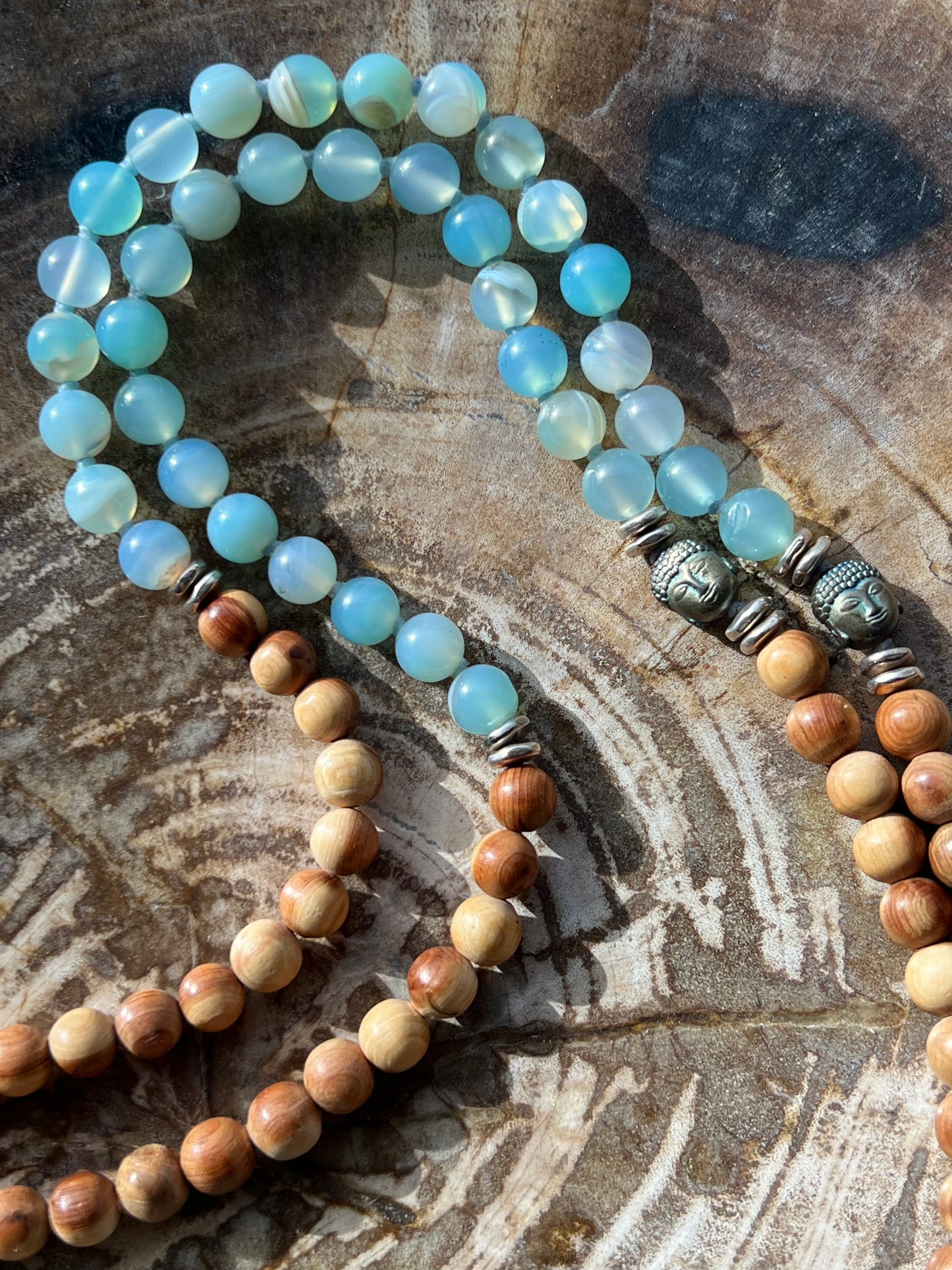 Mālā with Lake Blue Agate and Pearwood Beads with a Nepalese Silver Guru Bead, and a silky Tassel