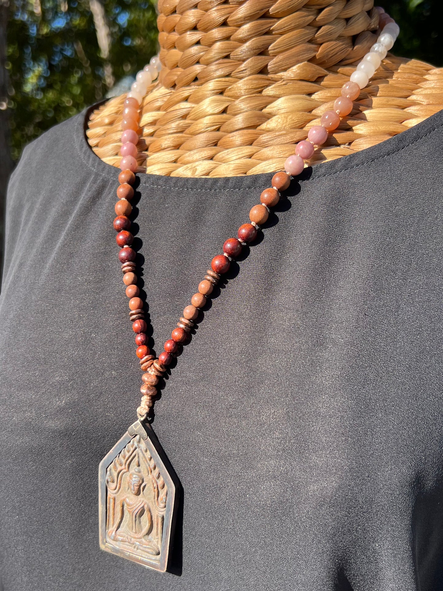 Half Mālā with Sunstone, Haitian Flower Rhodonite and Cherry Blossom Agate, Sandalwood, Indian Rosewood and Peach Aventurine with a Thai Buddha Pendant