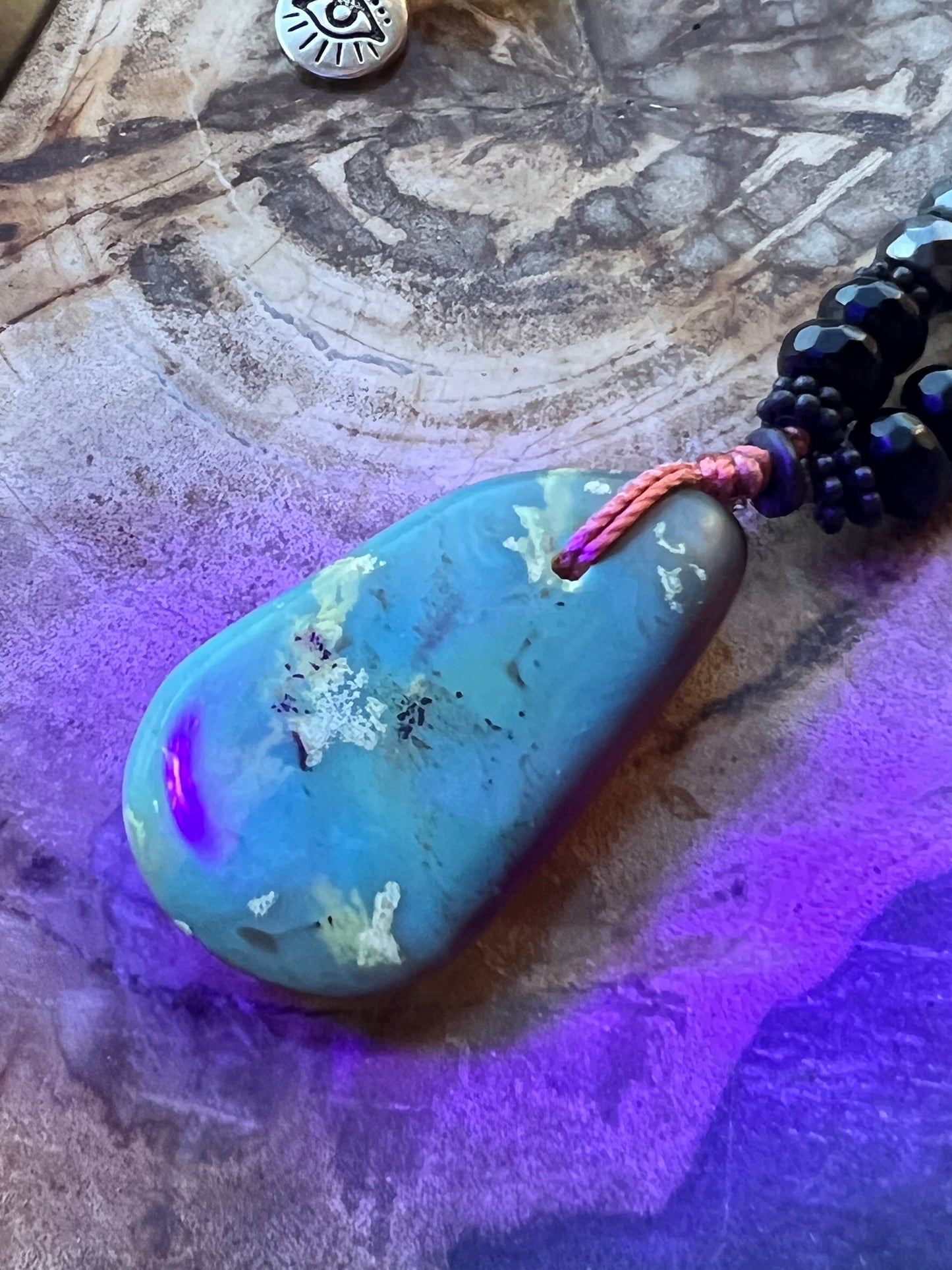 Mālā with Rare Blue Amber, Citrine, Tigerseye and Onyx Beads with a Blue Amber Pendant