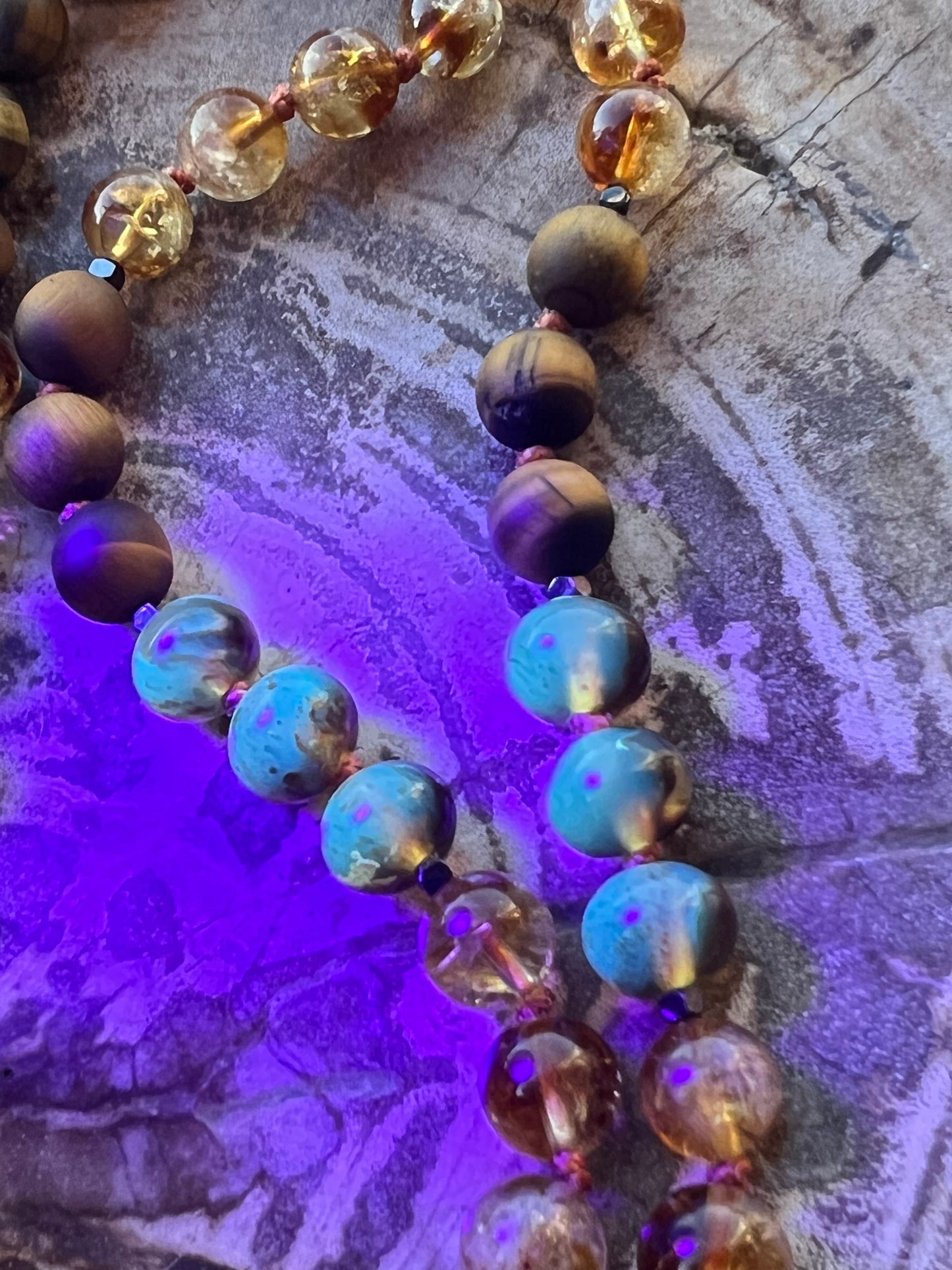 Mālā with Rare Blue Amber, Citrine, Tigerseye and Onyx Beads with a Blue Amber Pendant