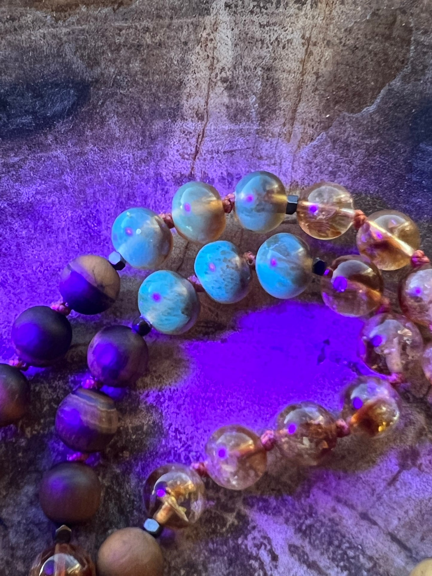 Mālā with Rare Blue Amber, Citrine, Tigerseye and Onyx Beads with a Blue Amber Pendant
