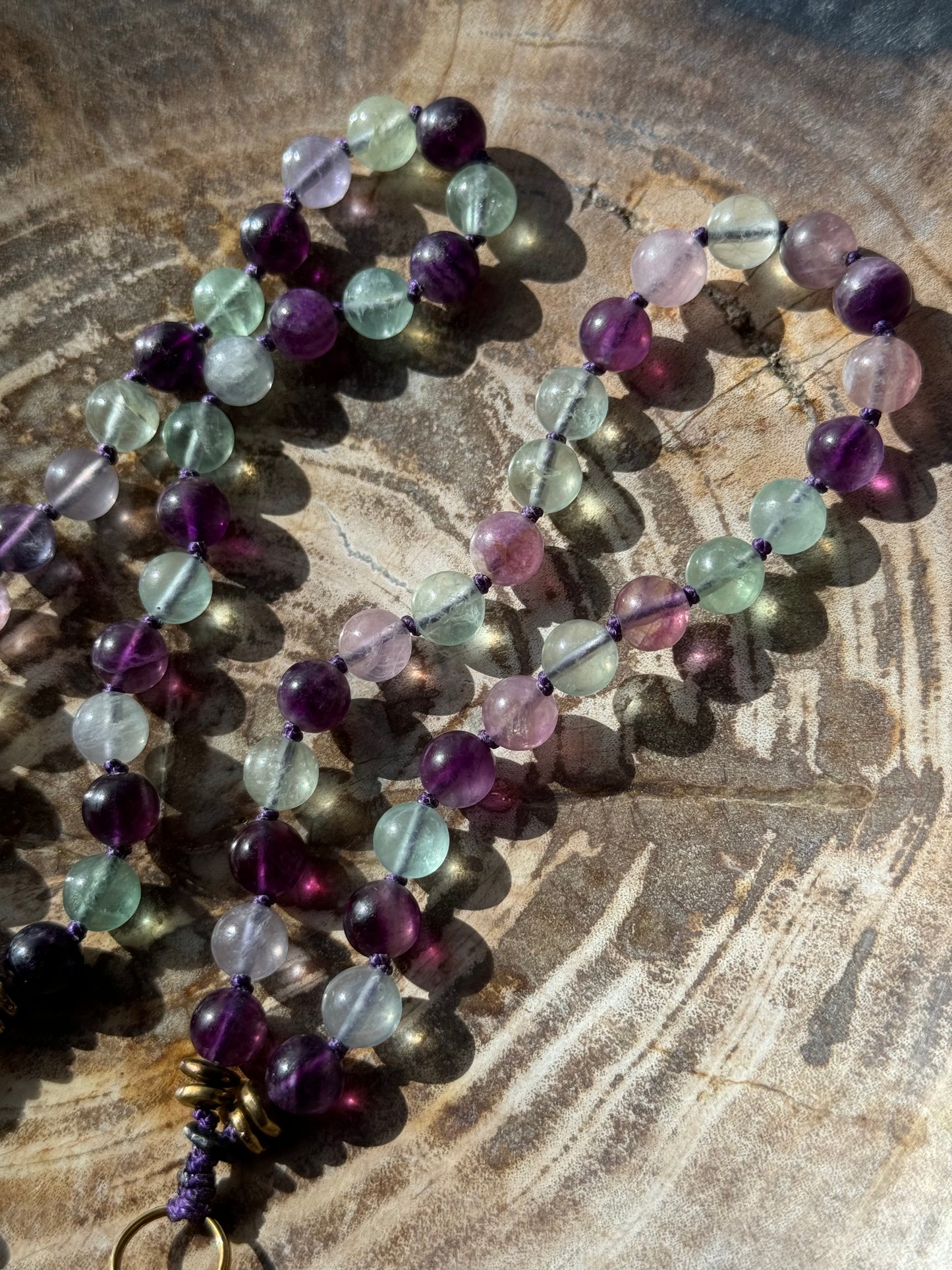Pocket Mālā with Rainbow Fluorite beads and Oil Bottle