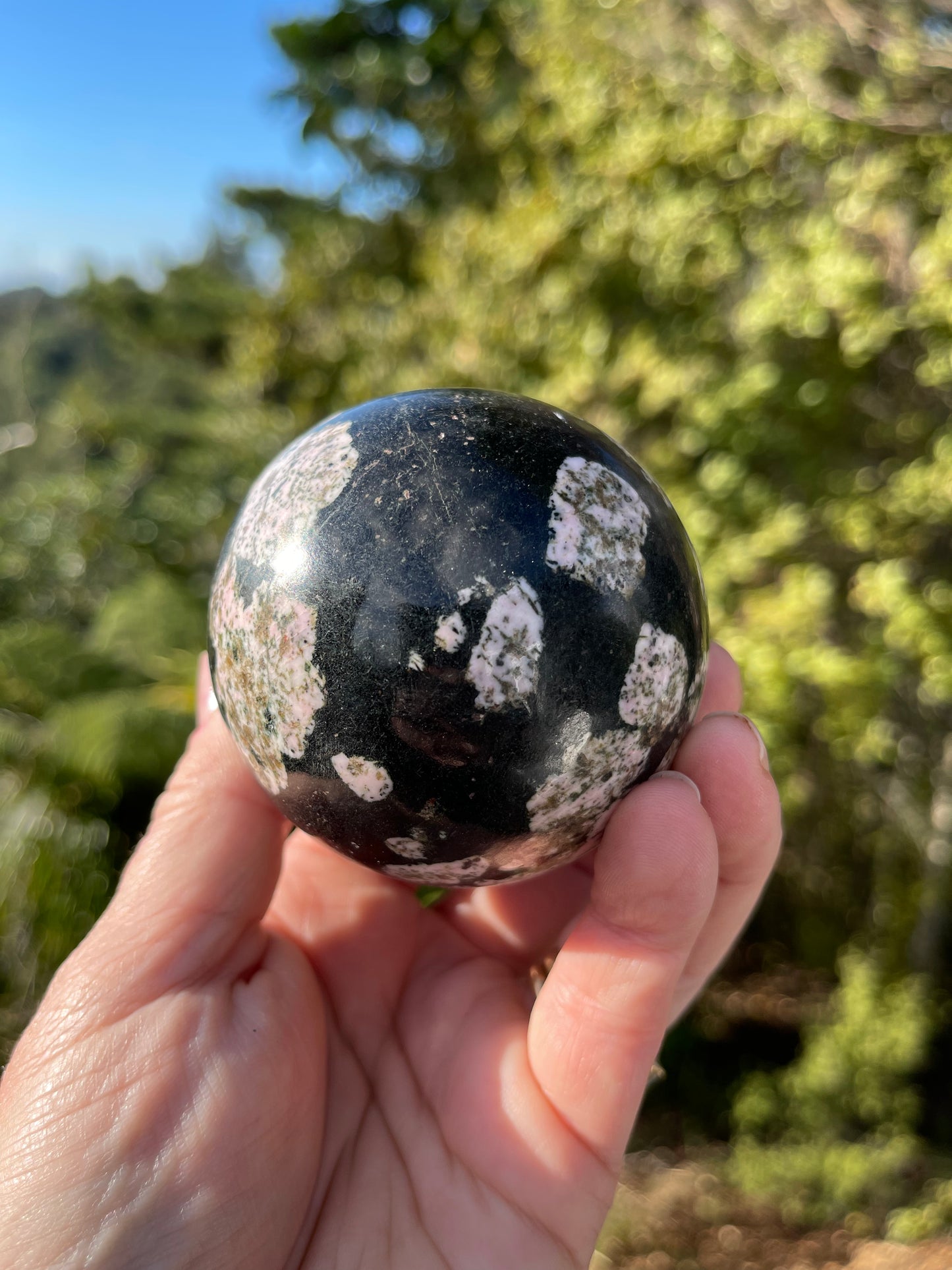 Black jade with Thulite Sphere