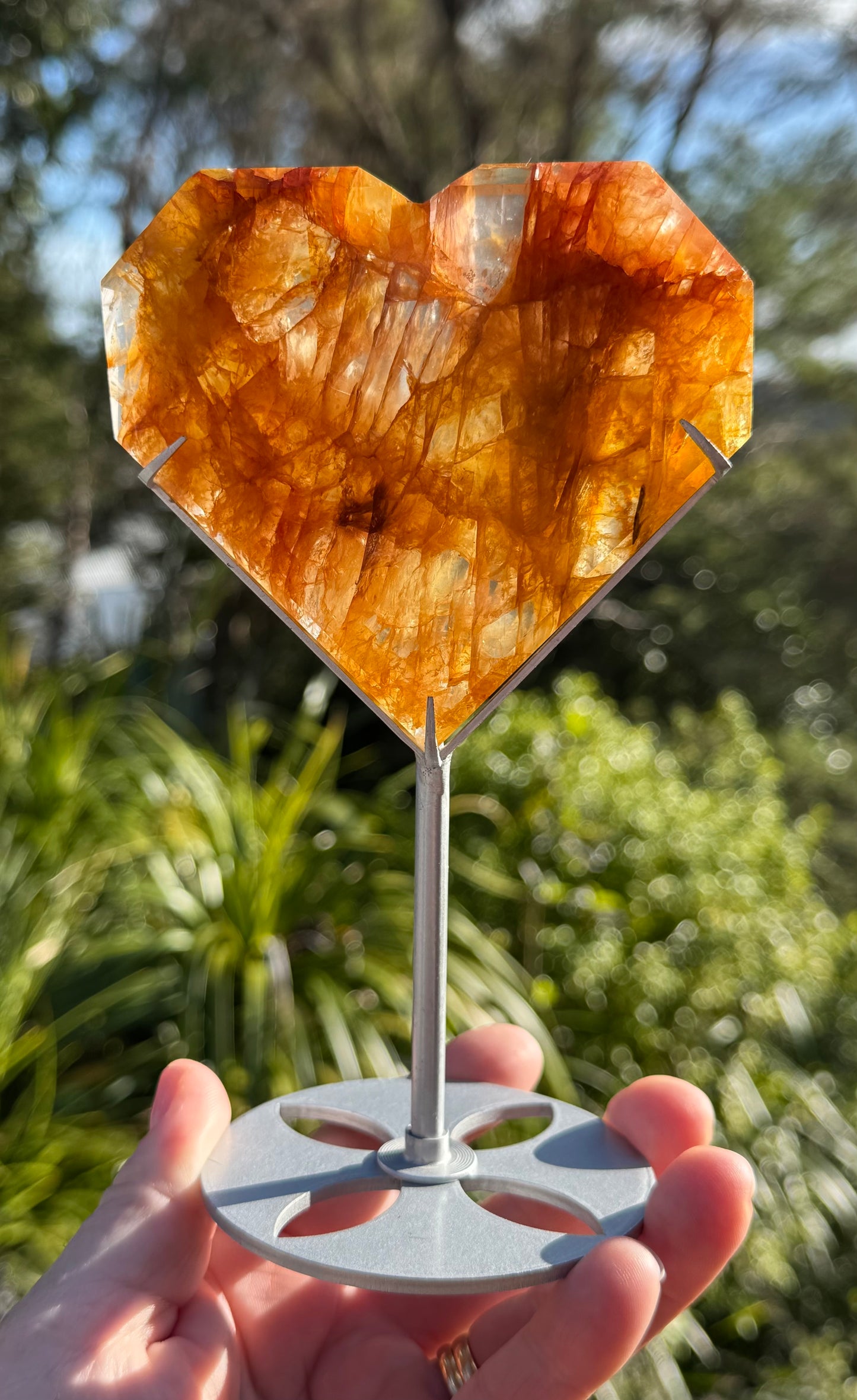 Golden Healer Quartz Faceted Heart on a stand