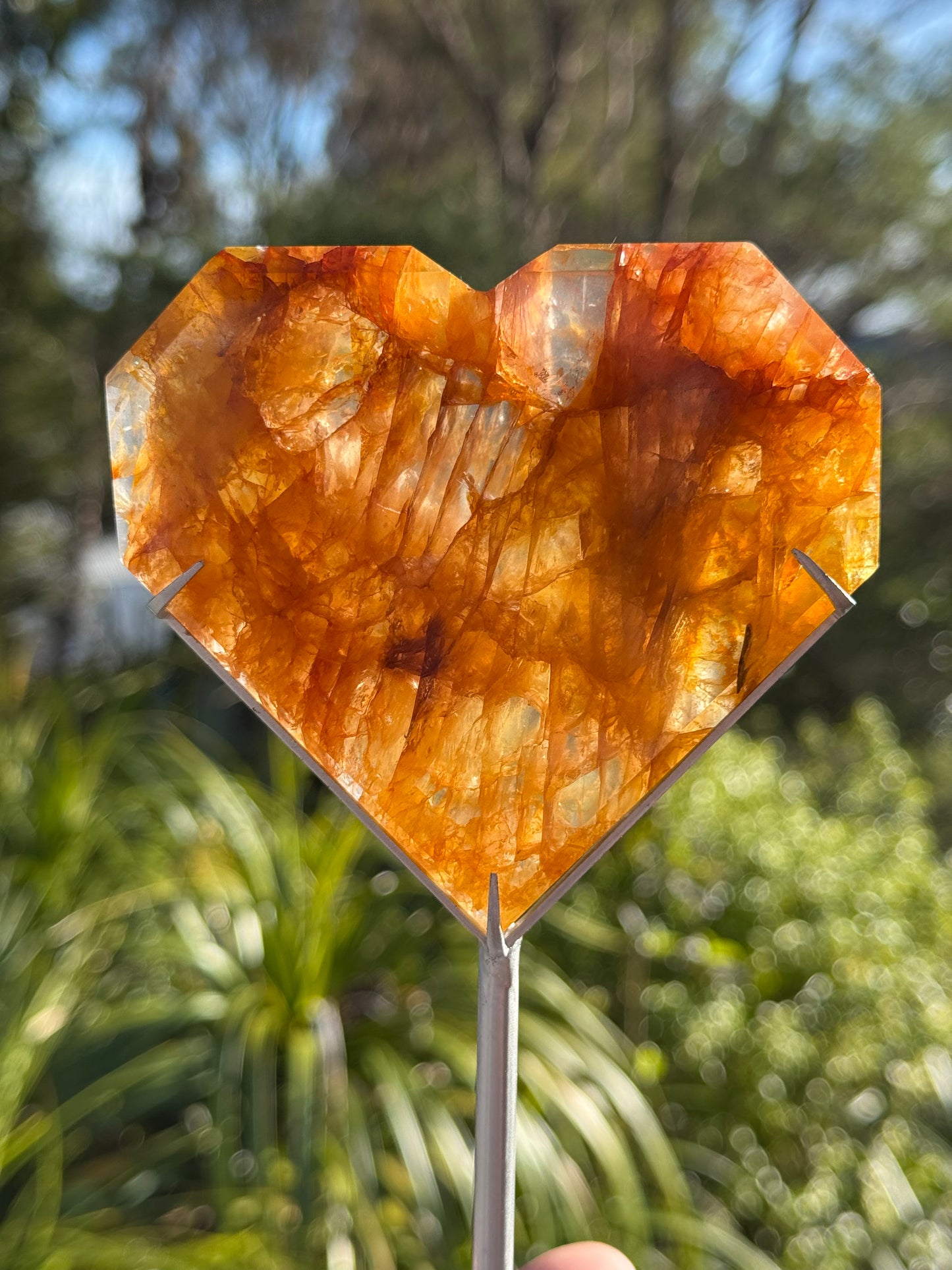 Golden Healer Quartz Faceted Heart on a stand