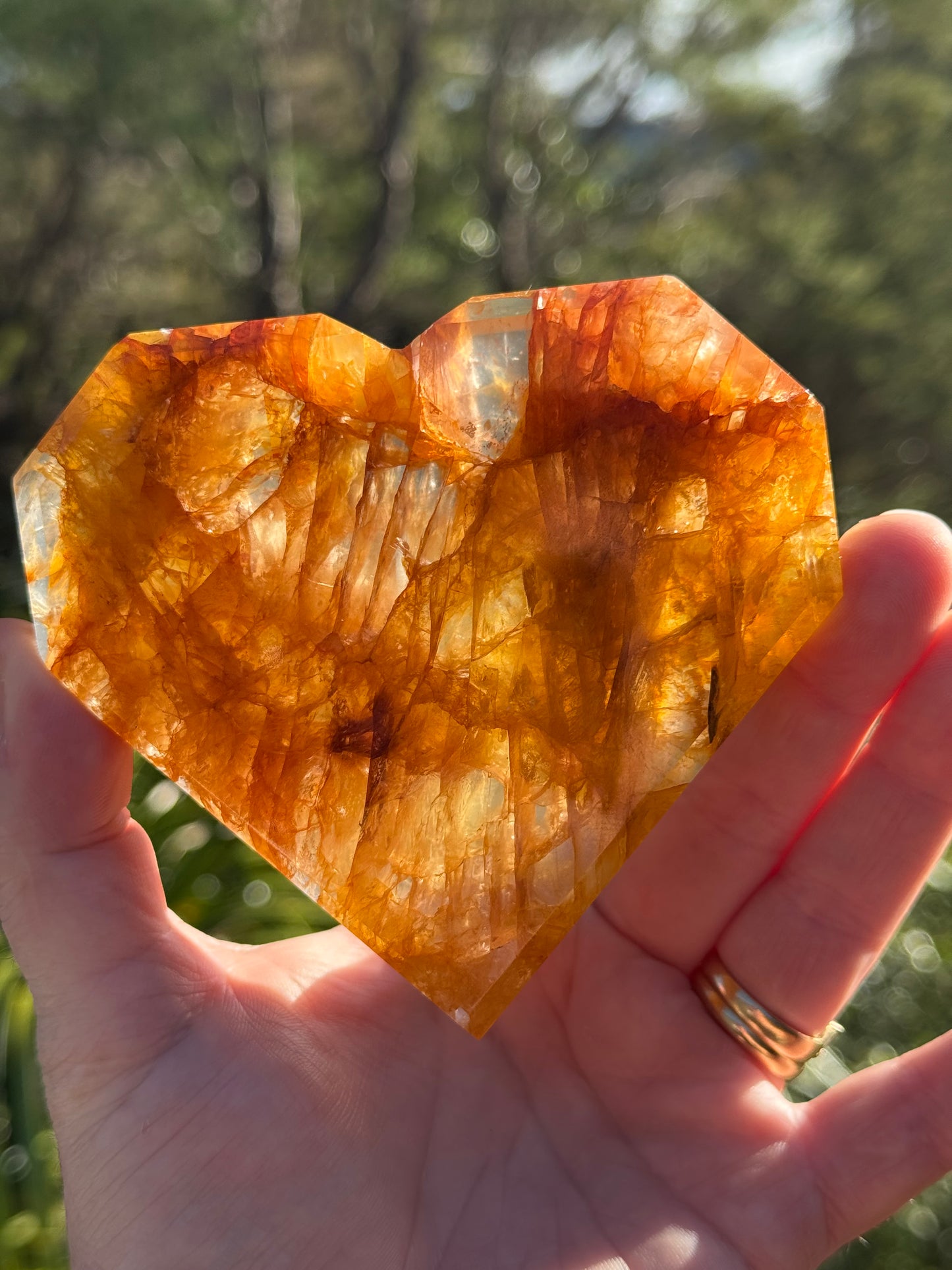 Golden Healer Quartz Faceted Heart on a stand