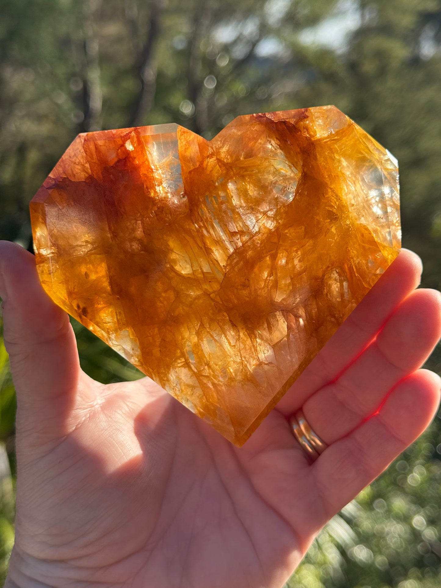 Golden Healer Quartz Faceted Heart on a stand