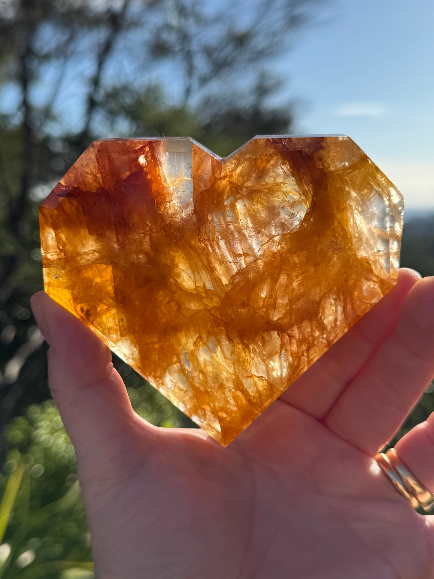 Golden Healer Quartz Faceted Heart on a stand