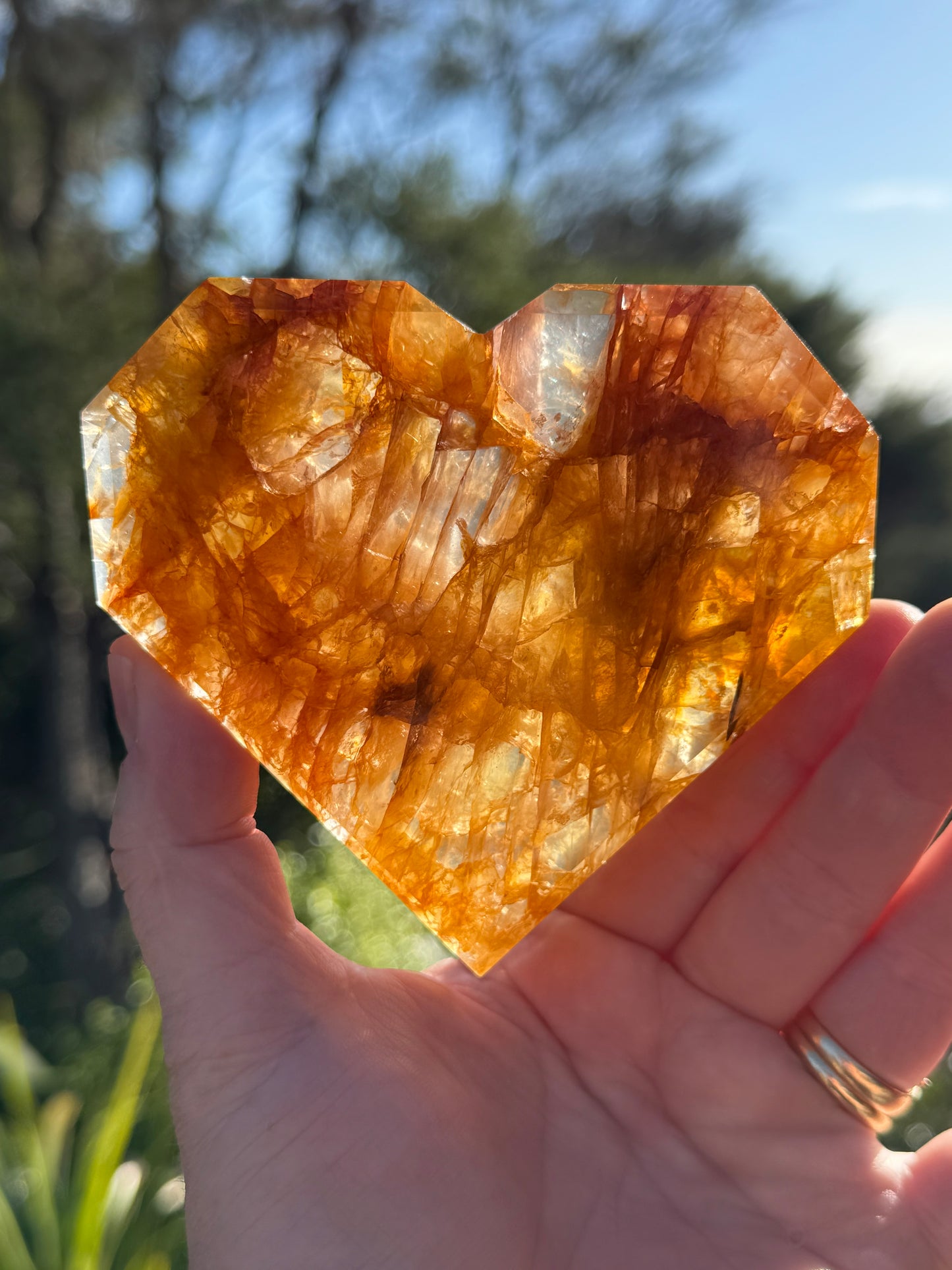 Golden Healer Quartz Faceted Heart on a stand