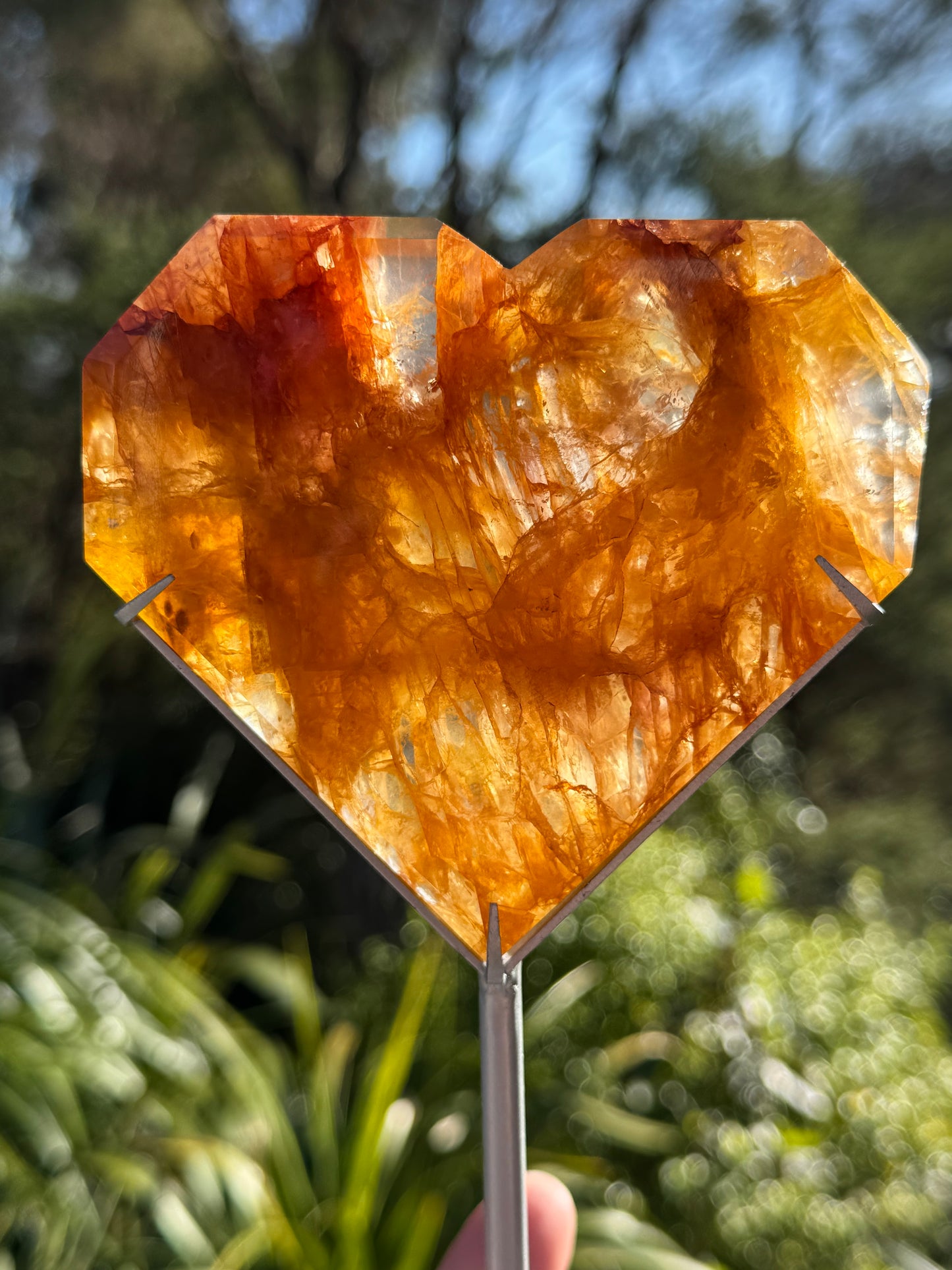 Golden Healer Quartz Faceted Heart on a stand