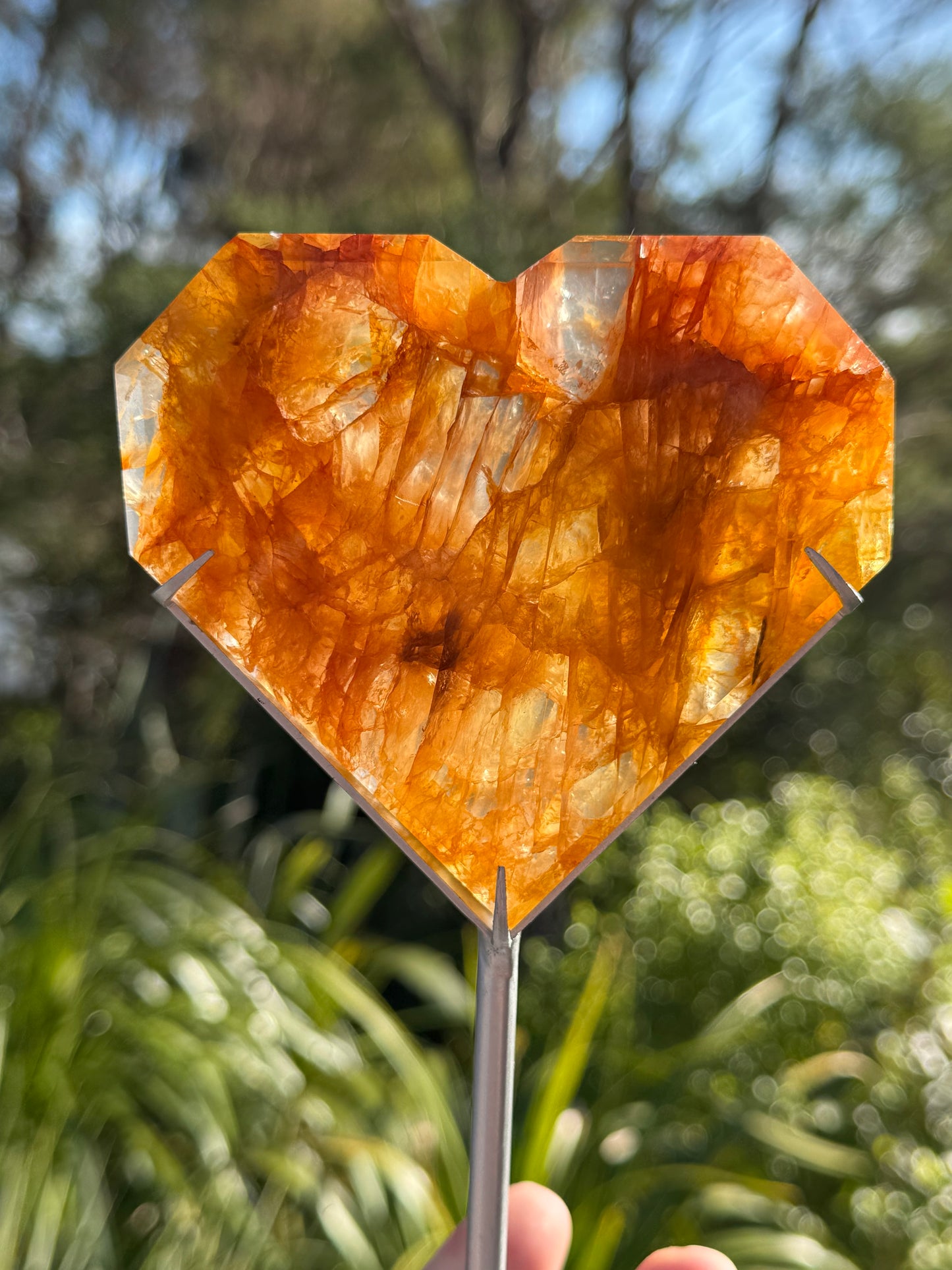 Golden Healer Quartz Faceted Heart on a stand