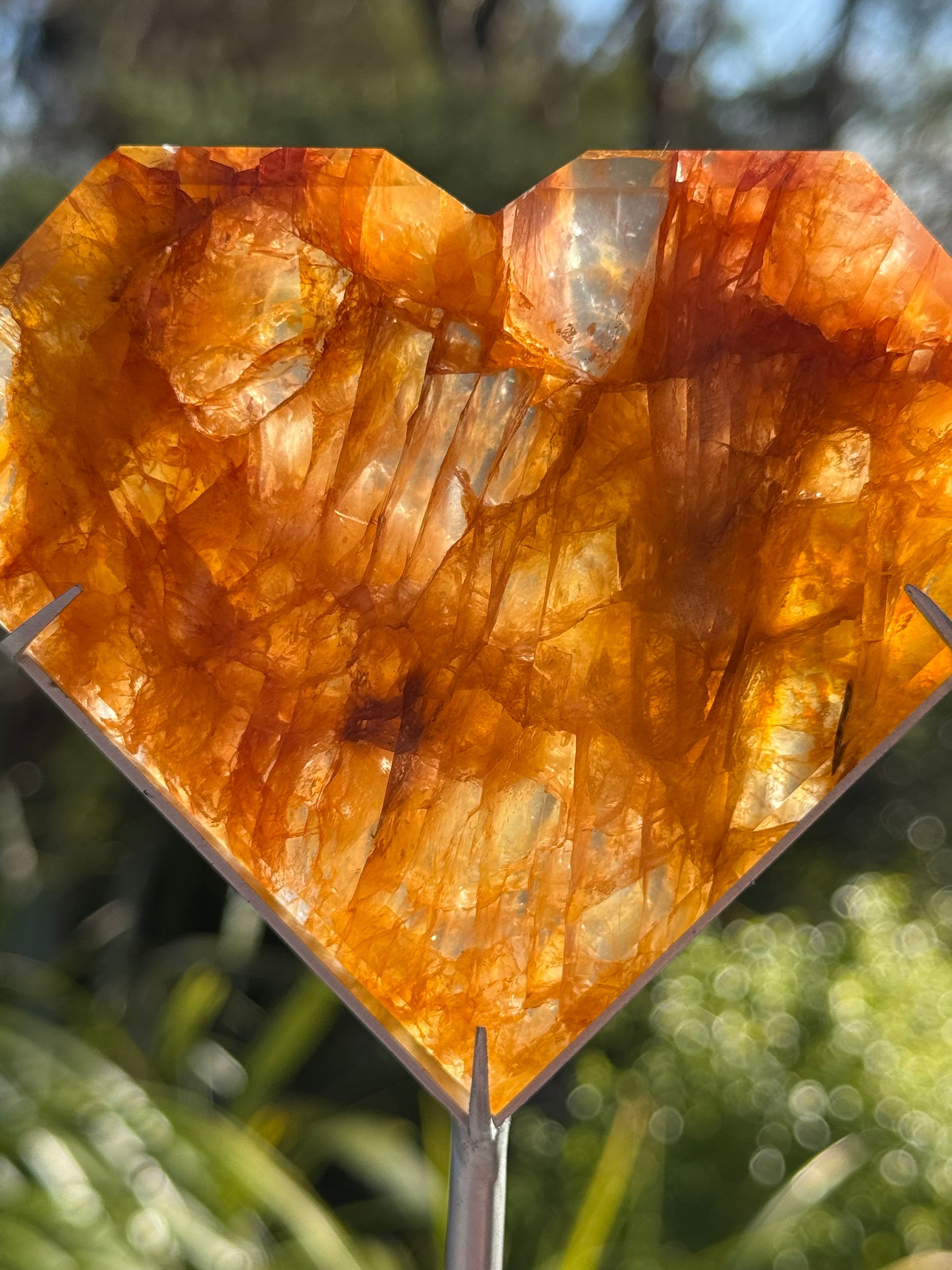 Golden Healer Quartz Faceted Heart on a stand