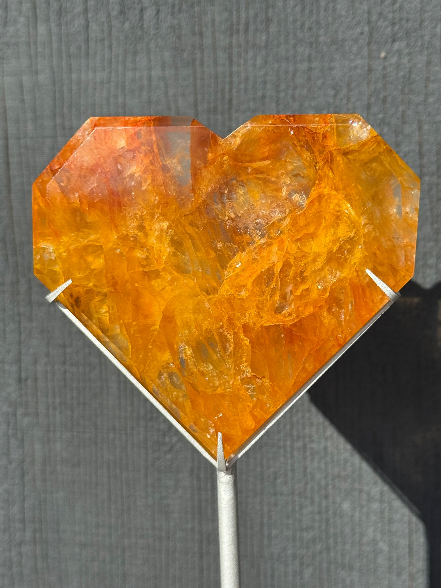 Golden Healer Quartz Faceted Heart on a stand