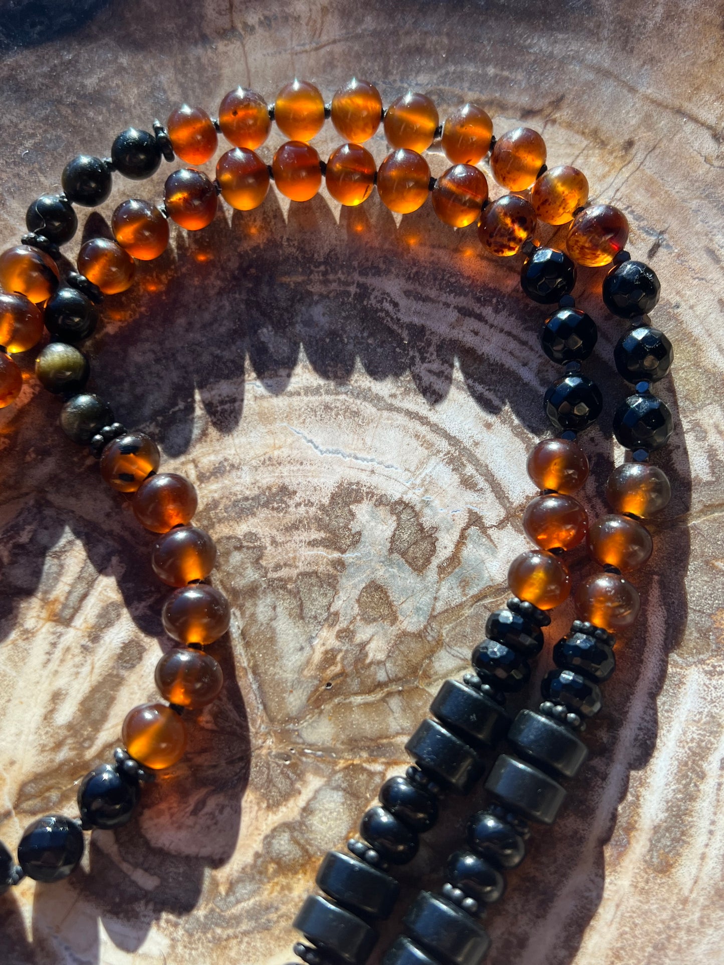 Mālā with Rare Blue Amber, Golden Sheen Obsidian and Onyx Beads with a Thai Buddha Pendant