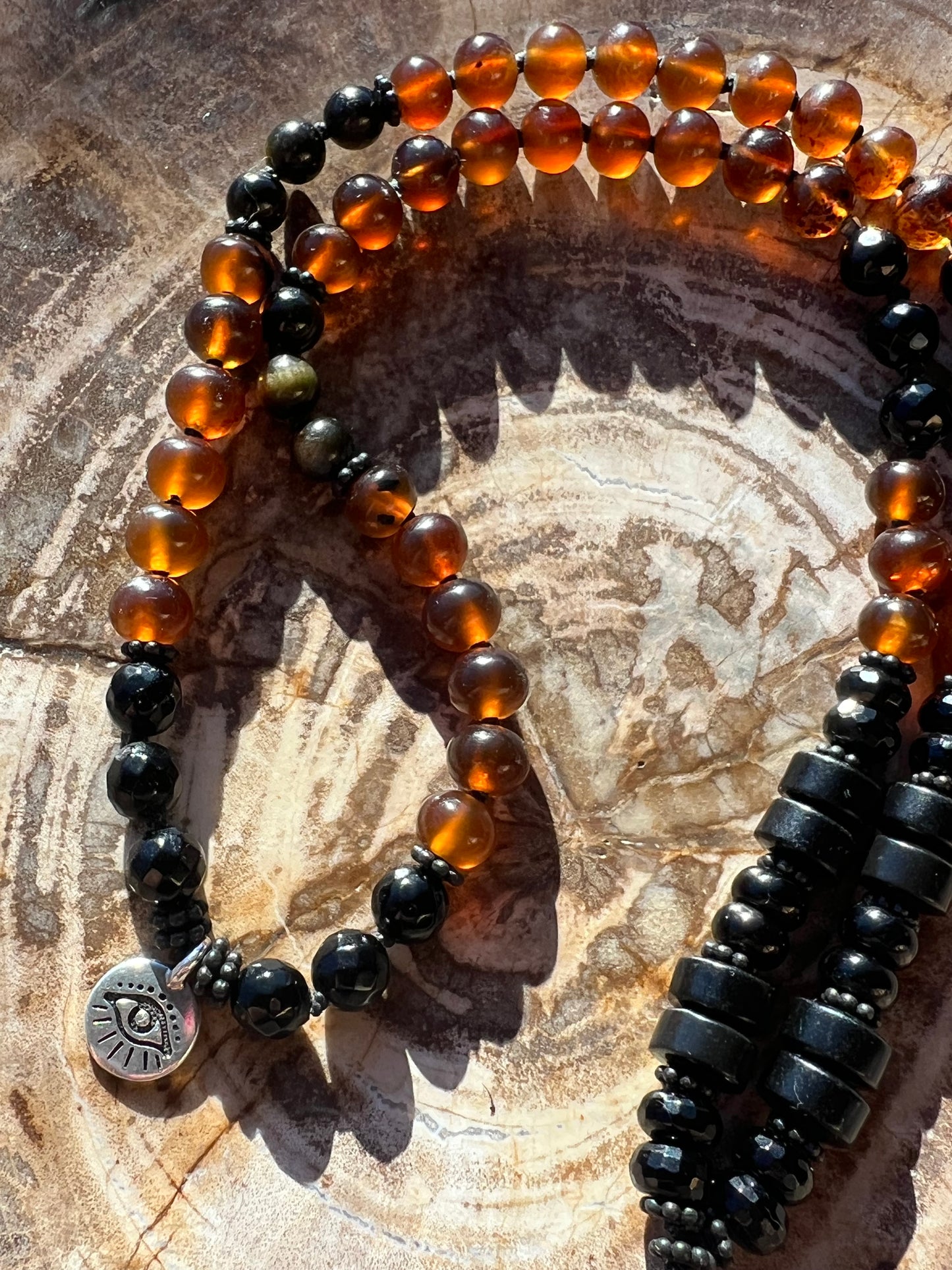 Mālā with Rare Blue Amber, Golden Sheen Obsidian and Onyx Beads with a Thai Buddha Pendant