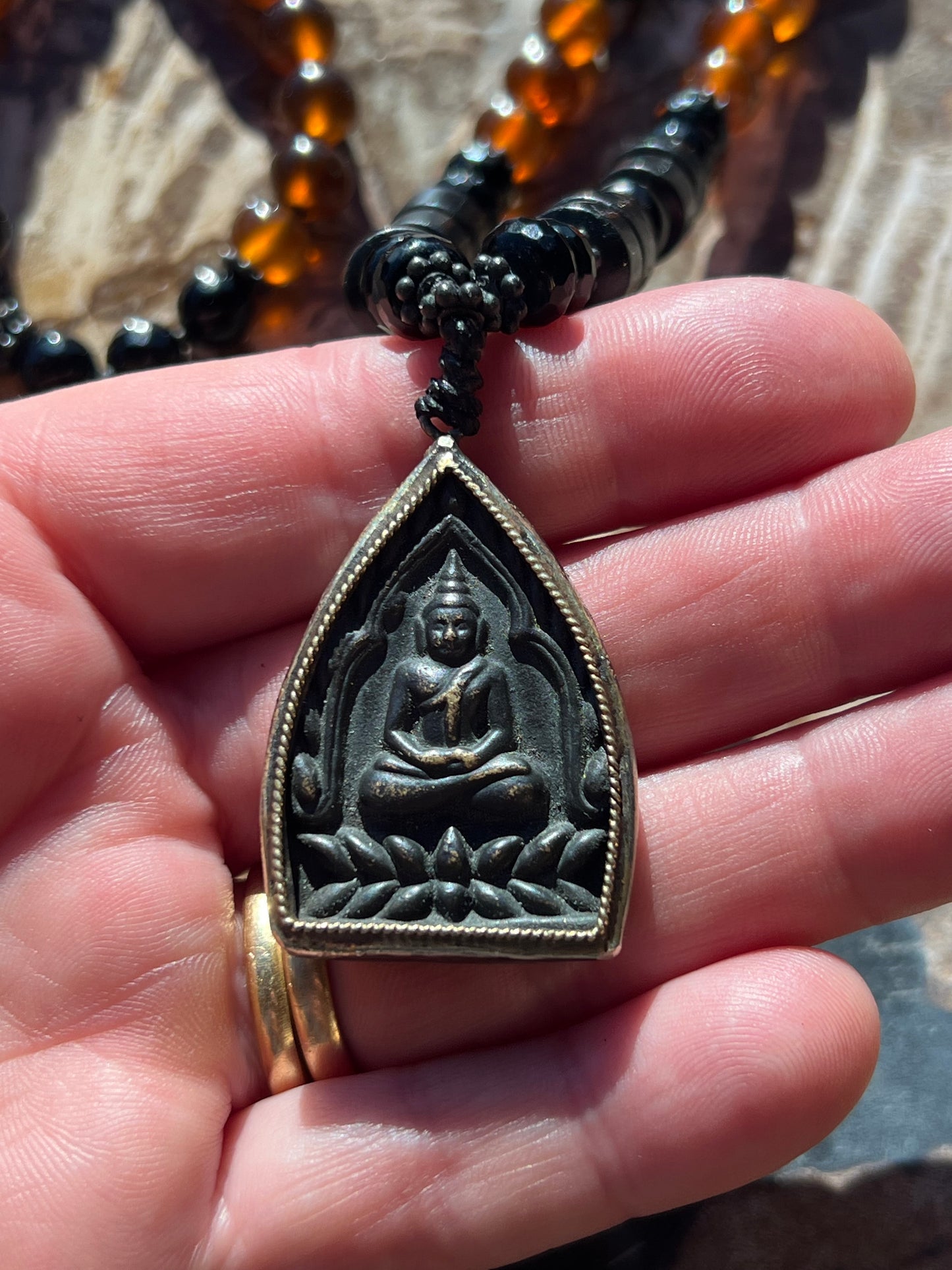 Mālā with Rare Blue Amber, Golden Sheen Obsidian and Onyx Beads with a Thai Buddha Pendant