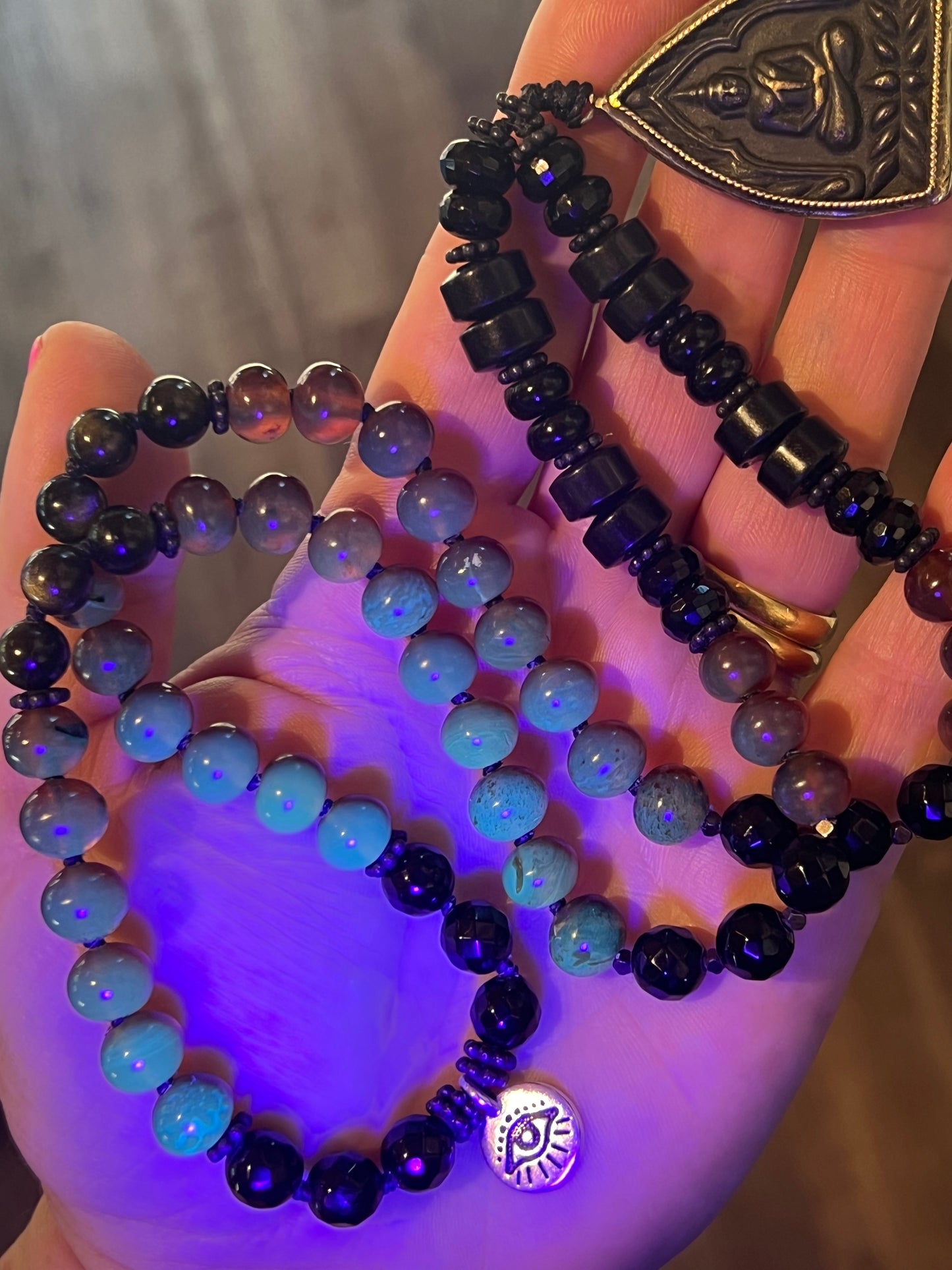 Mālā with Rare Blue Amber, Golden Sheen Obsidian and Onyx Beads with a Thai Buddha Pendant