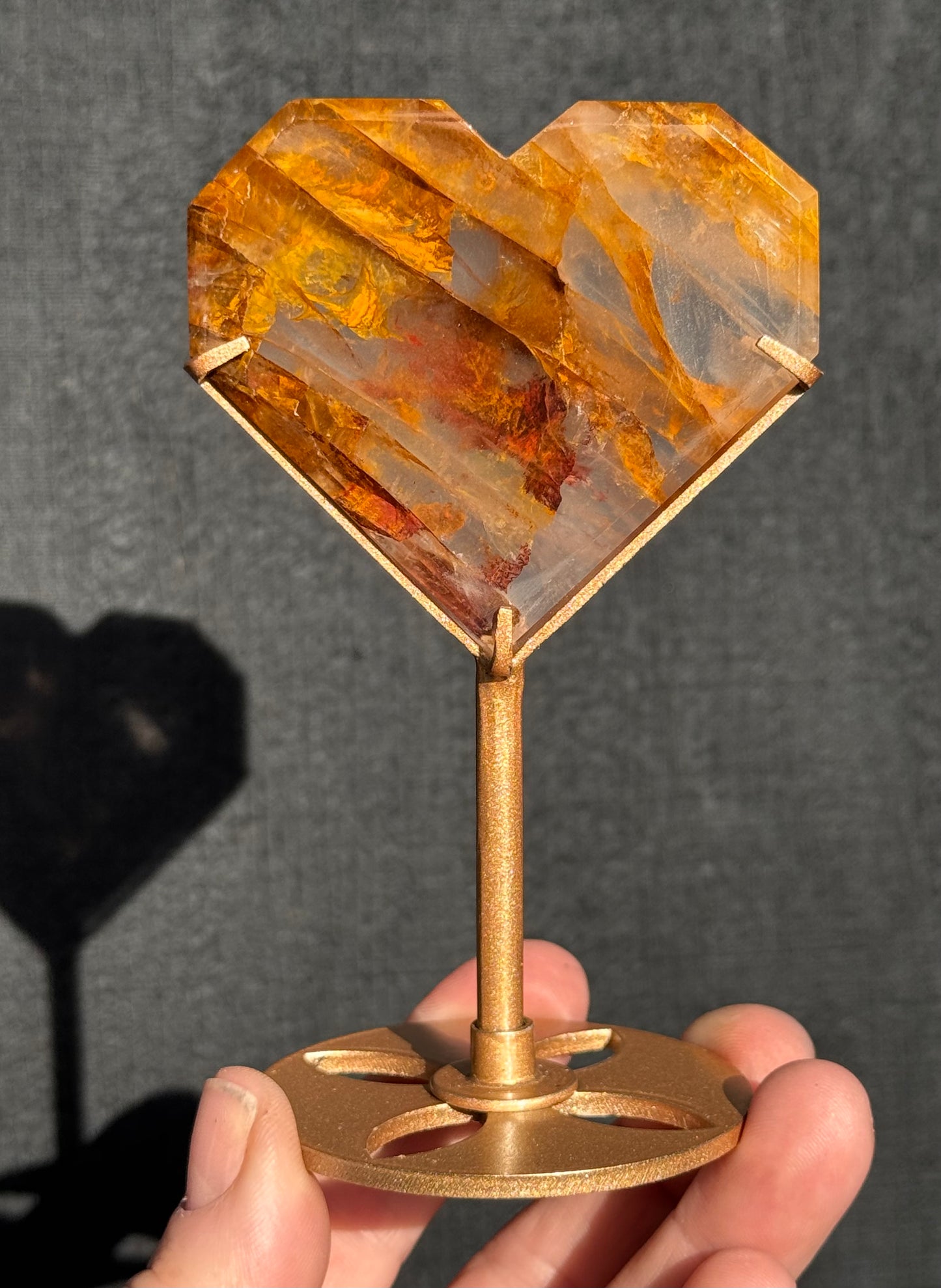 Golden Healer, Fire and Girasol Quartz Faceted Heart on a stand